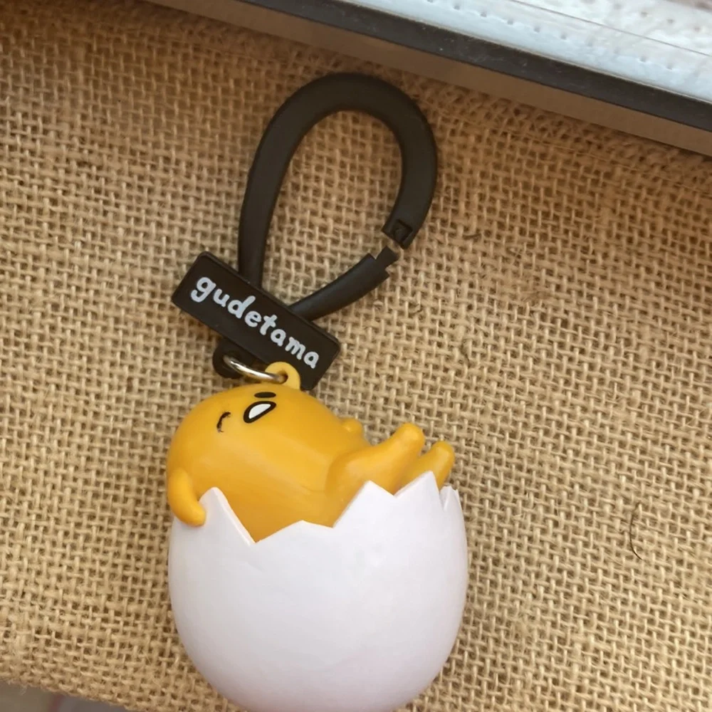Gudetama keychain in good condition egg man